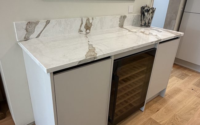 Sahara Waves quartz additional worksurface and storage in Winchcombe